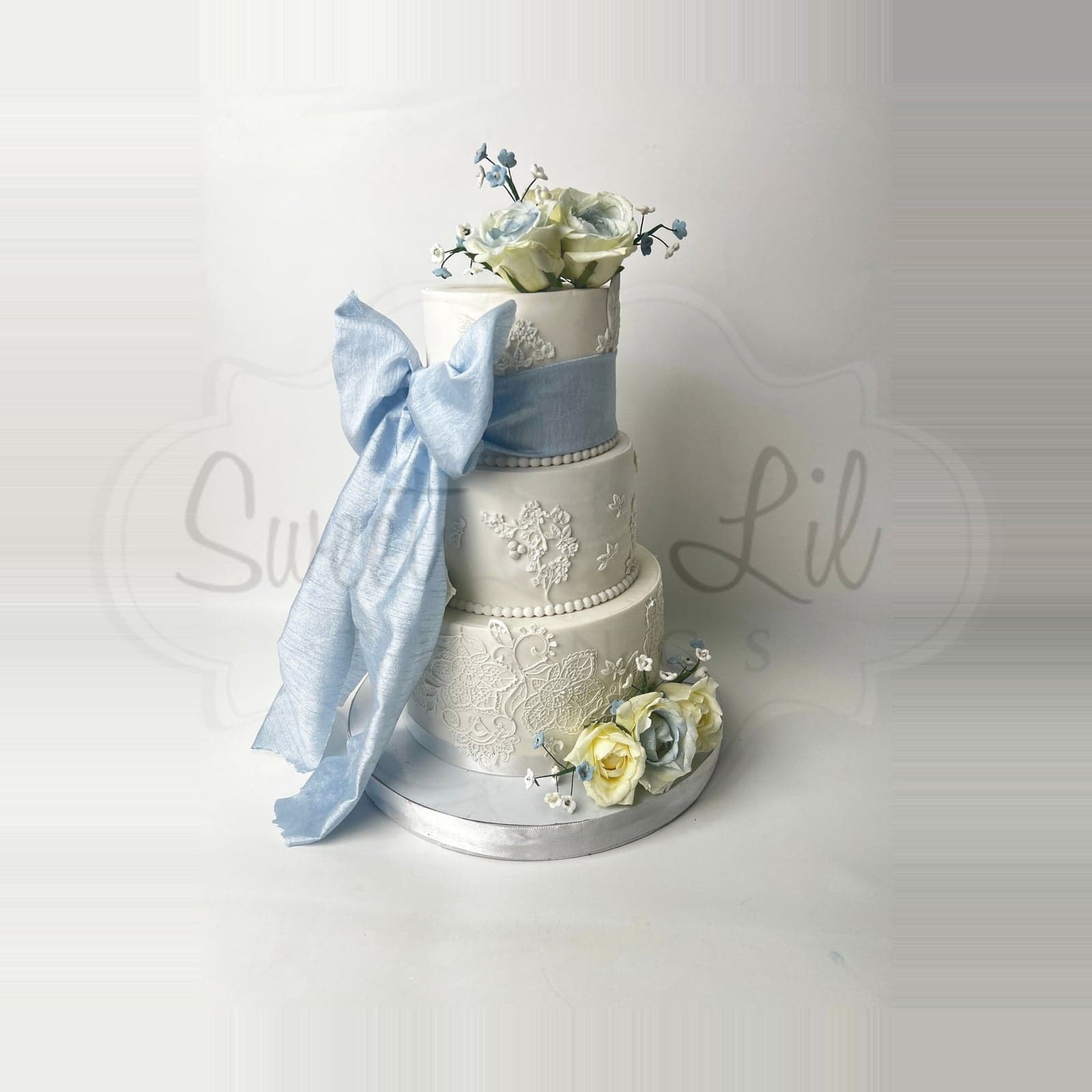 3 Tier Blue Bow Wedding Cake photo 2