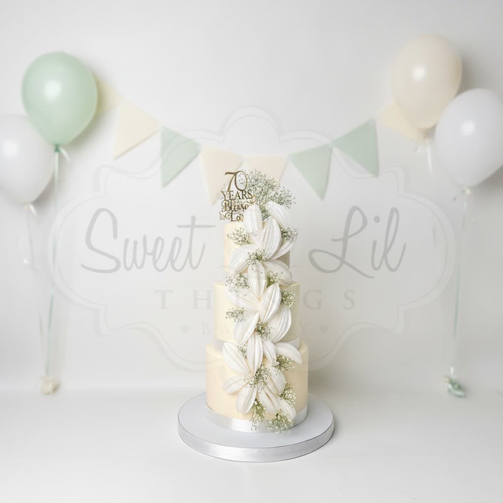 3 Tier Ivory Ruffle Floral Cake