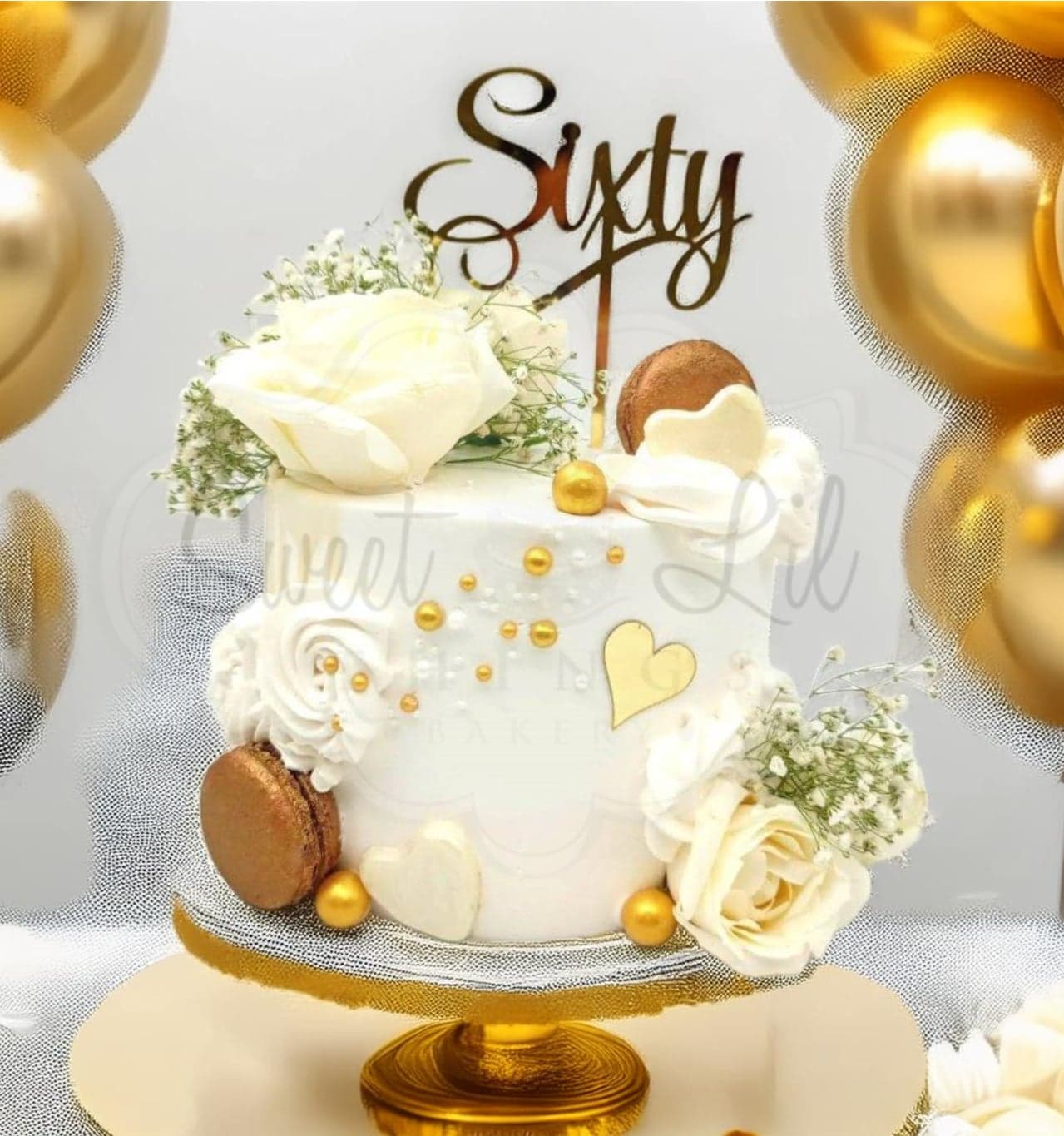 White Floral Birthday Cake with Macaroons