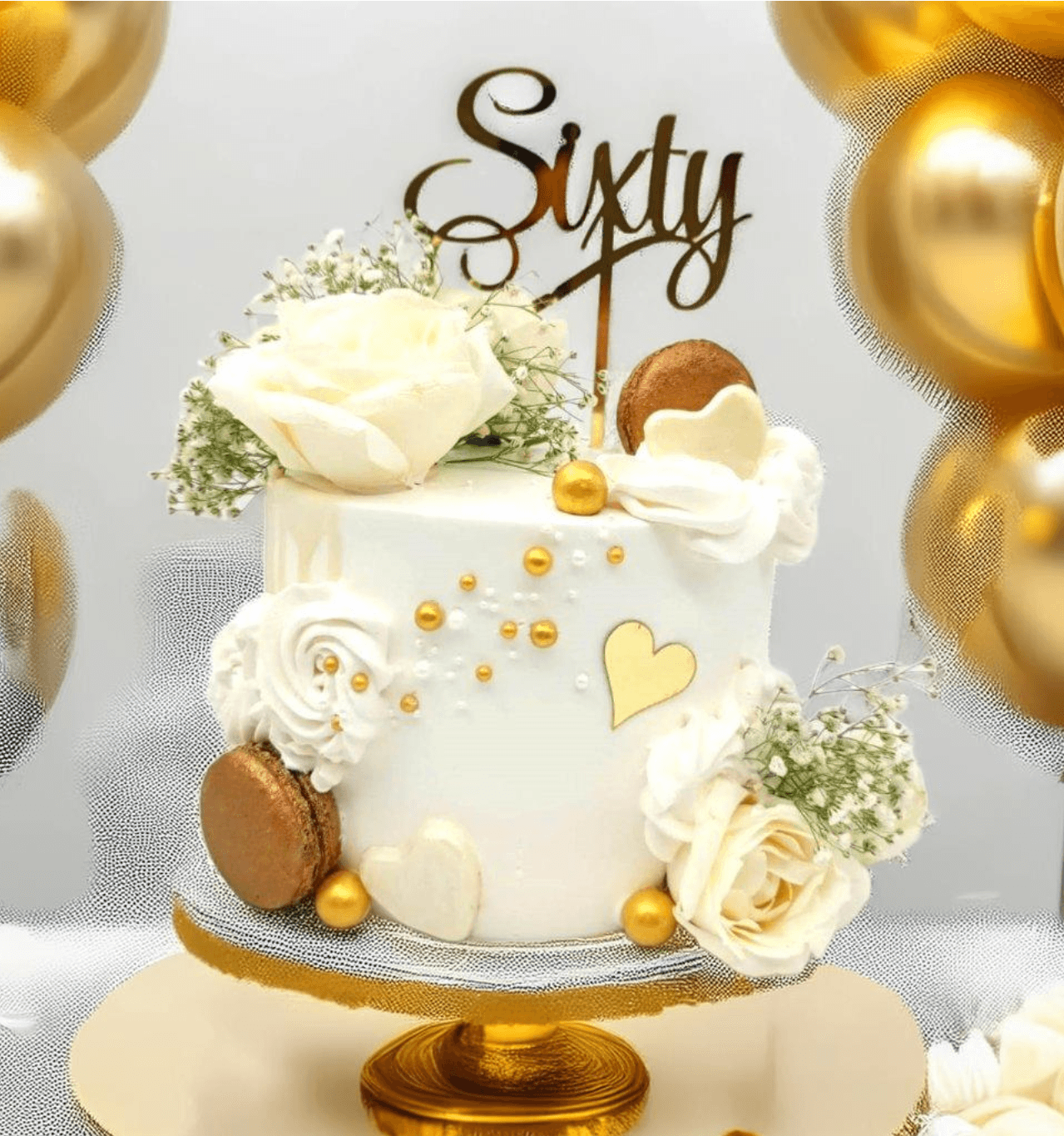 White Floral Birthday Cake with Macaroons