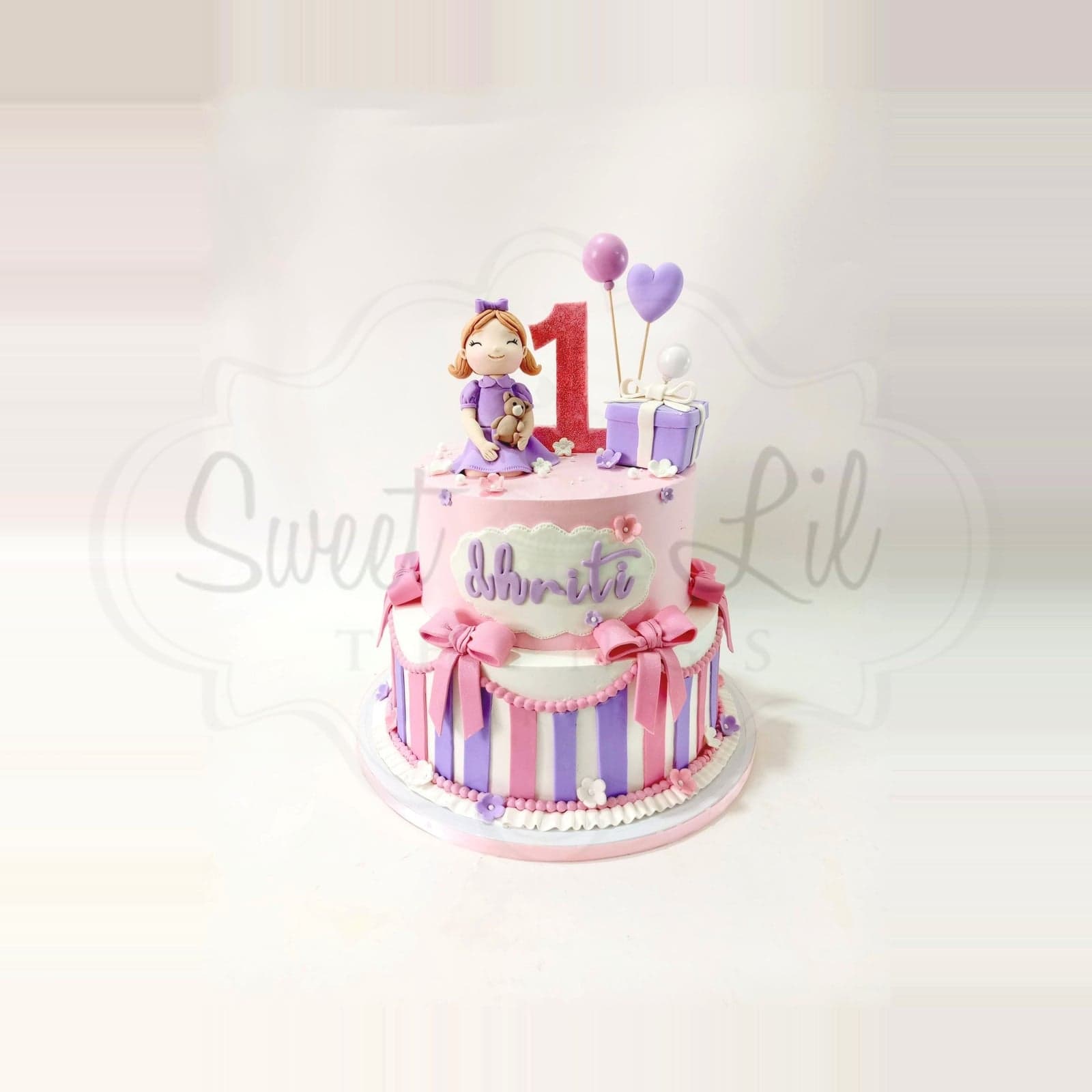 Pink and Purple Bows First Birthday Cake photo 2